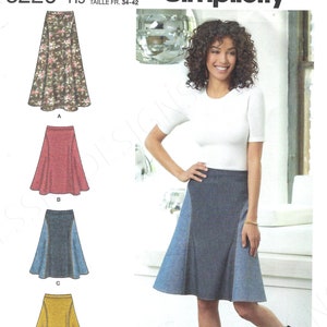 May include: A sewing pattern for a skirt with four different variations. The pattern is for sizes 6-14, 32-40, and 34-42. The pattern is designed and printed in the USA. The pattern number is 8220 H5.