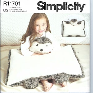 May include: A sewing pattern for making plush animal pillows. The pattern includes instructions for making a hedgehog, a pig, a lamb, and a bunny. The pattern is designed and printed in the USA. The pattern is easy to sew.