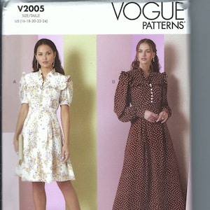 Könnte beinhalten: Vogue Patterns Schnittmuster für ein Kleid mit zwei Variationen. Das Kleid hat einen Rüschenkragen und eine Knopfleiste vorne. Die erste Variante ist ein kurzärmeliges Kleid mit einem Blumenmuster. Die zweite Variante ist ein langärmeliges Kleid mit einem braunen Punkte-Muster. Das Schnittmuster ist für die Größen DE 38-40-42-44-46.