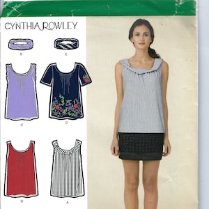 May include: A sewing pattern for a sleeveless top with a gathered neckline. The pattern includes four different variations of the top, including a striped top, a solid red top, a solid purple top, and a navy blue top with floral embroidery. The pattern is for sizes H5 6, 8, 10, 12, 14, EUR 32-40, FR 34-42.