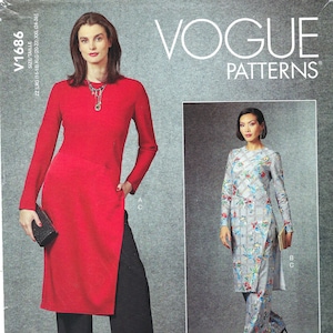 May include: Vogue Patterns sewing pattern for two dresses. The first dress is a red long-sleeved tunic with a side slit and black pants. The second dress is a blue and white floral print long-sleeved tunic with matching pants. The pattern number is V1686.