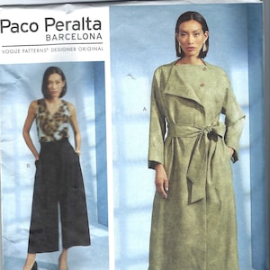 May include: A sewing pattern for a long, belted, green coat with a collar and a button closure. The pattern is from Vogue Patterns and is designed by Paco Peralta, Barcelona. The pattern number is V1619 and the sizes are 6-8-10-12-14.