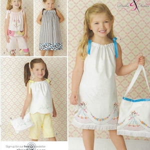 May include: A sewing pattern for a girl's dress and matching bag. The pattern is called "Simplicity" and the pattern number is 2391. The dress is white with a blue ribbon and embroidered details. The bag is white with a blue ribbon and embroidered details. The pattern is for sizes 3, 4, 5, 6, 7, and 8.