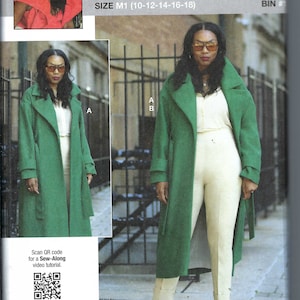Può includere: Un cartamodello per un cappotto verde con cintura. Il cartamodello si chiama "Know Me" di Mimi G ed è di taglia M1 (10-12-14-16-18). Il cartamodello include un codice QR per un tutorial video di cucito.
