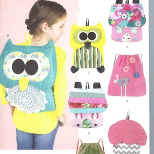 May include: A sewing pattern for making children's backpacks. The pattern includes instructions for making backpacks shaped like an owl, a house, a tree, and a bird. The pattern is from Simplicity and is for one size.