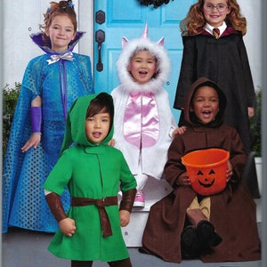 May include: A Simplicity sewing pattern for children's Halloween costumes. The pattern includes five different costumes: a blue princess, a green elf, a pink unicorn, a brown monk, and a black Harry Potter-inspired costume. The pattern number is R10320 and the size is S-L.