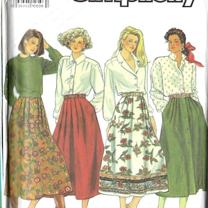 May include: Simplicity sewing pattern 9876 featuring four women's fashion designs. The designs include skirts and blouses. The pattern includes sizes H5 (6-14). The image shows the Simplicity logo.