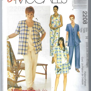 May include: A sewing pattern for a women's dress, pants, and top. The pattern is for sizes 22, 24, 26, 40, and 124. The pattern is called "Easy McCall's" and "Womanstyle".