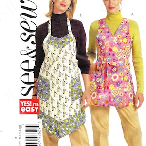 May include: A sewing pattern for two different aprons. The first apron is white with a pattern of wine bottles and grapes. The second apron is pink with a floral pattern. Both aprons have a tie at the waist and a pocket on the front. The pattern is called "see & sew" and is labeled "B5274".