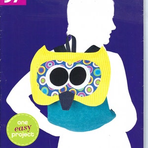 May include: A sewing pattern for a yellow and blue owl backpack. The pattern is called "Sew Simple" and is for one easy project. The pattern is priced at 97 cents.