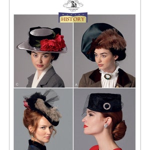 May include: A vintage sewing pattern for four different styles of hats. The pattern is from Butterick Making History and is numbered B6397. The hats are a black and silver hat with red flowers, a black and green hat with a feather, a black hat with a veil, and a black hat with a veil and a brooch.
