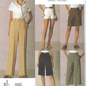 May include: Vogue Basic Design sewing pattern 2532 featuring various women's bottoms. The pattern includes shorts, culottes, and wide-leg pants. The image shows the different styles, including a pair of tan wide-leg pants and a white button-up shirt.