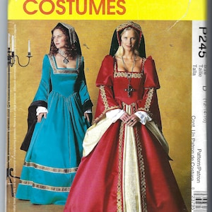 Op de afbeelding: McCall's Costumes patroon met twee Renaissance jurken. Eén is turquoise met gouden randen, de andere is rood met gouden en crèmekleurige accenten. Maten D (12-14-16).