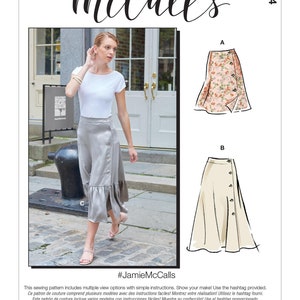 May include: McCall's sewing pattern M8044 featuring skirt designs. The image shows a woman wearing a gray skirt with a ruffle hem. The pattern includes multiple view options with simple instructions. The text "#JamieMcCalls" is also visible.