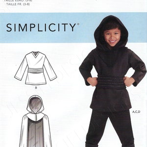 Puede incluir: Un patrón de costura para un disfraz de niño, que incluye una túnica con capucha, pantalones y una capa. El patrón es para las tallas 3-8. El patrón es de Simplicity.