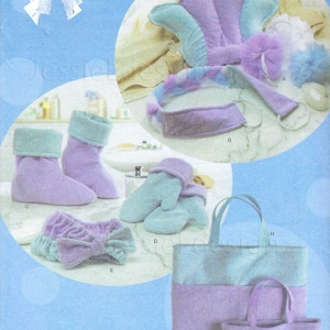May include: A sewing pattern for a variety of bath and spa items, including a bath pillow, a headband, a pair of slippers, a pair of mittens, and two bags. The pattern is from Simplicity and is for size A, all sizes. The pattern is illustrated with a light blue and purple color scheme.