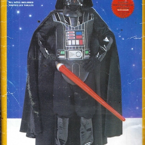 May include: A vintage Star Wars Darth Vader costume pattern. The package features a full-body black costume with a helmet, chest plate, and a red lightsaber. The package reads "BOY'S" and "ALL SIZES INCLUDED".