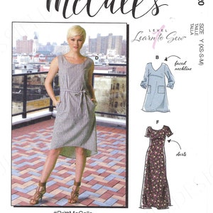 May include: McCall's sewing pattern M7120, Learn to Sew, size Y (XS-S-M), featuring a dress with a faced neckline and darts. The pattern includes instructions for making a dress with a high-low hemline and a dress with a longer, flowing skirt.