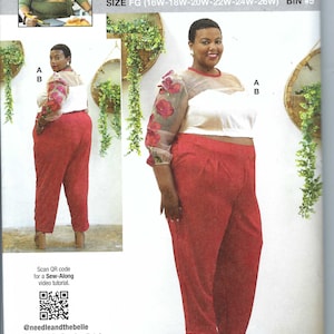 Può includere: Un modello di cucito per un completo a due pezzi. Il top è bianco con maniche trasparenti decorate con ricami floreali rossi. I pantaloni a vita alta sono di un rosso vibrante. Il modello è di Aaronica B. Cole per Know Me.