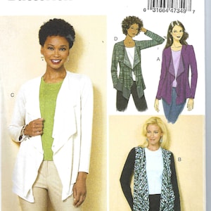 May include: A sewing pattern for a cardigan with a draped front. The pattern is for sizes extra small, small, and medium. The pattern is from Butterick and has the number B6527 on it.