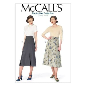May include: Two women's skirts from McCall's The Archive Collection, circa 1933. The skirt on the left is a gray, pleated skirt. The skirt on the right is a floral print skirt with a green background and blue flowers.