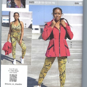 Può includere: Un modello di cucito con una donna che indossa abbigliamento sportivo. L'outfit include un reggiseno sportivo, leggings e una giacca rossa con stampa zebrata gialla e nera. Il modello è etichettato "KNOWME" di Mimi G, taglia K5 (8-10-12-14-16).