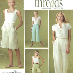 May include: Simplicity sewing pattern featuring various women's clothing designs. The image showcases a collection of outfits, including culottes, shorts, and wide-leg pants, paired with tops. The pattern includes the text "threads MAGAZINE COLLECTION".