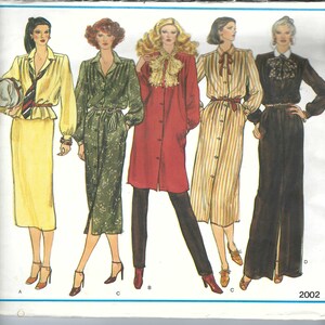 May include: A sewing pattern for five different dress styles. The pattern includes a long-sleeved, button-down dress with a collar, a long-sleeved, button-down dress with a collar and a belt, a long-sleeved, button-down dress with a collar and a bow, a long-sleeved, button-down dress with a collar and a belt, and a long-sleeved, button-down dress with a collar and a bow. The pattern is for size 2002.