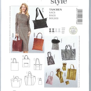 Op de afbeelding: Een Burda Style naaipatroon voor tassen, met instructies in het Duits, Frans, Engels, Spaans en Italiaans. Het patroon bevat instructies voor het maken van verschillende soorten tassen, waaronder shoppers, clutches en schoudertassen. Het patroon is gemakkelijk te volgen en bevat naadtoeslagen.