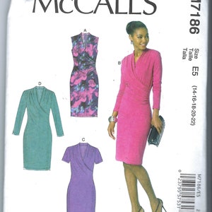 May include: McCall's sewing pattern M7186 featuring wrap dresses. The pattern includes options for different sleeve lengths and a floral print design. The size range is E5 (14-16-18-20-22).