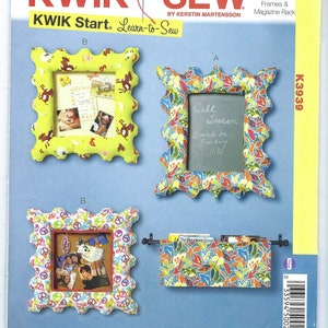 May include: A sewing pattern for making three fabric frames and a magazine rack. The frames are decorated with different patterns and have scalloped edges. The magazine rack is decorated with a floral pattern. The pattern is called "Kwik Sew" and is a "Learn-to-Sew" project.