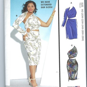 May include: A sewing pattern for a dress with three different views. The dress is a midi length and has a cut-out detail at the waist. The pattern includes sizes W2 (20W-22W-24W-26W-28W).
