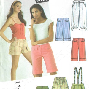 May include: A sewing pattern for girls' shorts. The pattern includes six different styles of shorts, including cuffed, pleated, and suspender styles. The pattern is for sizes 3/4 to 9/10 and is from Simplicity.