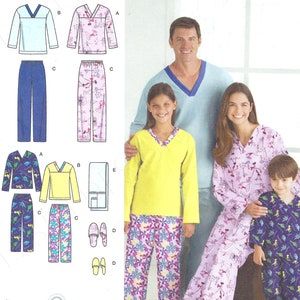 Peut inclure: Patron de couture Simplicity numéro 3935 pour pyjamas. Le patron comprend des instructions pour la confection de pyjamas pour adultes et enfants. Le patron montre une famille portant des pyjamas de différentes couleurs et motifs, notamment bleu, rose, jaune et floral.
