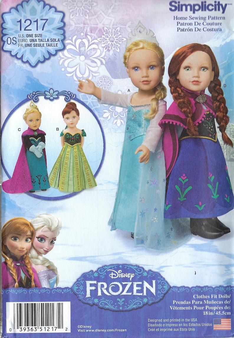 May include: Simplicity sewing pattern 1217 for making Frozen doll clothes. The pattern includes instructions for making a blue and white dress, a purple and green dress, and a purple cape. The pattern is designed for 18-inch dolls.