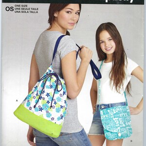 May include: Simplicity sewing pattern number 8119, titled "It's So Easy." The pattern is for a drawstring bag and a crossbody bag. The bags are shown in a white and blue floral print with a green bottom. The pattern is available in one size.