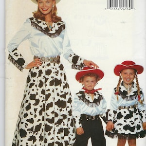May include: Butterick sewing pattern 4655 featuring outfits with cow-print skirts and cuffs, black fringe trim, and light blue shirts. The pattern includes designs for a long skirt, pants, and shirts, all accented with western-style belts and hats.