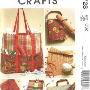 May include: A sewing pattern for a set of five craft bags. The bags are made of red and white plaid fabric with floral accents. The pattern includes instructions for making a tote bag, a needle roll, a pincushion, a scissor case, and a small bag with multiple pockets.