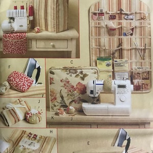 May include: A sewing pattern for a set of storage items for sewing supplies. The pattern includes a cover for a sewing machine, a cover for an iron, a needle holder, a pincushion, and a storage organizer. The pattern is from Butterick and is called Waverly.