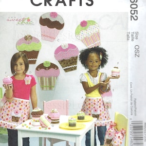May include: Sew Sweet Chic by Susan Cousineau, a sewing pattern for making cupcake-themed aprons and accessories. The pattern includes instructions for making a variety of cupcake-themed items, including aprons, bags, and decorations. The pattern is for size OSZ.