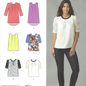 May include: A sewing pattern for a women's blouse with five different variations. The pattern includes a white blouse with lace sleeves, a pink blouse, a purple blouse, a yellow blouse, and a floral blouse. The pattern is for sizes 4-12.