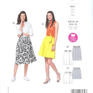 Puede incluir: Un patrón de costura para una falda con dos estilos diferentes. El patrón incluye instrucciones para una falda de estampado blanco y negro y una falda amarilla. El patrón es para las tallas 8-18 y es fácil de seguir.