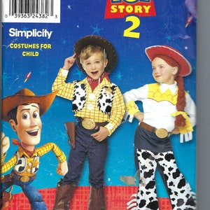 May include: A Simplicity sewing pattern for children's costumes. The pattern is for Toy Story 2 costumes, featuring Woody and Jessie. The pattern is for sizes 3-8.