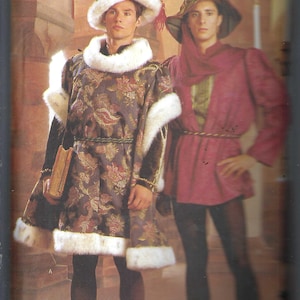 May include: A Butterick pattern for historical costumes. The image shows two people wearing medieval-style outfits. One is in a floral patterned robe with white fur trim, a matching hat, and holding a book. The other is in a red tunic and hat.