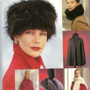 May include: Vogue Accessories sewing pattern V0661 featuring instructions for a faux fur hat, a faux fur collar, a cape with a collar, and a long scarf. The envelope displays various finished garments in black, grey, and white faux fur and red fabric.