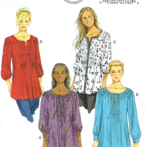 May include: A sewing pattern for four different blouses. The pattern is for sizes 8-10-12-14-16. The pattern is from Butterick and is number B5861. The pattern shows four different styles of blouses, one red, one blue, one purple, and one white with black floral print.