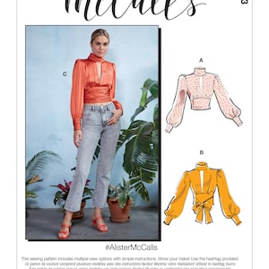 May include: A sewing pattern for a blouse with three different views. The pattern includes a red blouse with a keyhole neckline, a pink blouse with polka dots, and a yellow blouse with a bow tie. The pattern is called "#AlisterMcCalls".
