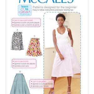 May include: A sewing pattern booklet with instructions for making four different skirts. The booklet features a model wearing a white tank top and a pink and white gingham skirt. The booklet also includes instructions for sewing a patch pocket, tie ends, and gathers.