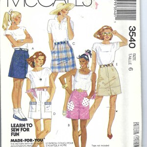 May include: A sewing pattern for a skirt with four different styles. The pattern is for size 6 and includes instructions for making the skirt. The pattern is called "Made-for-You" and features built-in fit adjustments. The pattern is printed on white paper with a blue and white border.