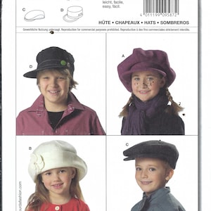 May include: Image of a sewing pattern for children's hats. The pattern includes illustrations of four different hat styles, including a beret, a cloche, and a newsboy cap. The pattern also includes measurements for head circumferences of 20 1/2, 21 1/4, and 22 1/4 inches.